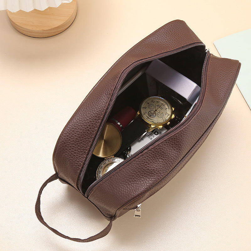 Waterproof storage bag in brown color, showing inside contents including watches and accessories.